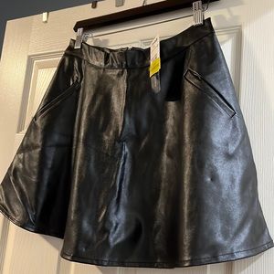 Faux leather mini-skirt. Never worn.